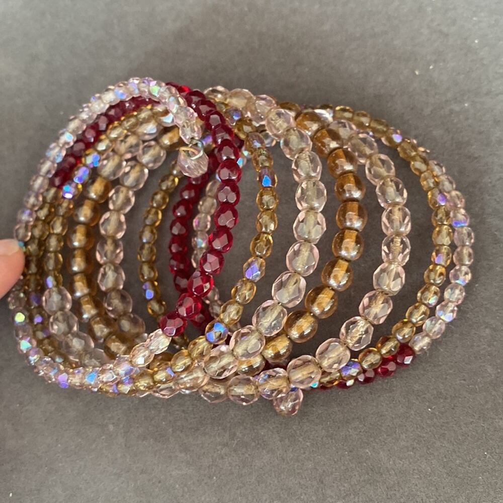 Eight Strand multicolored and multi beaded slinky bracelet.